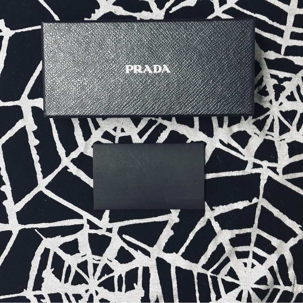 Prada ⚠️ Black Textured Sunglasses  Box w/ lens cloth in envelope.